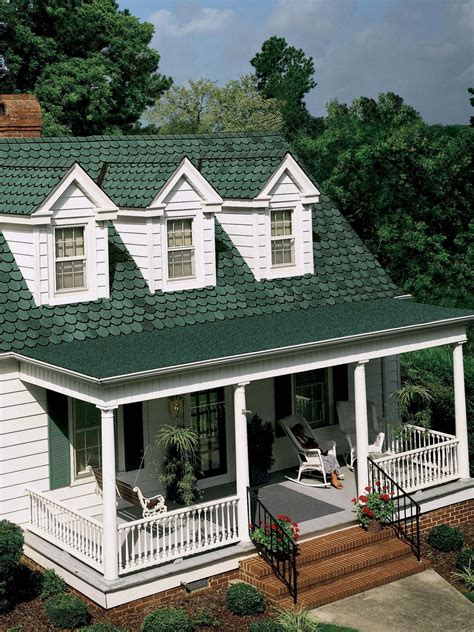 houses with green metal roofs|farmhouse with green metal roof.